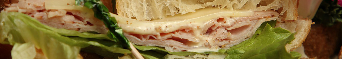Eating Sandwich at Cornerstone Cafe restaurant in Orangeburg, SC.
